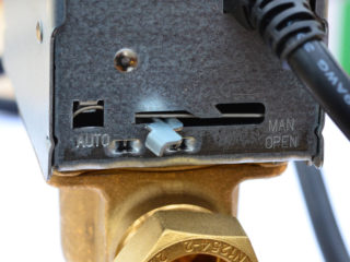 Honeywell motorised valve, showing the manual lever
