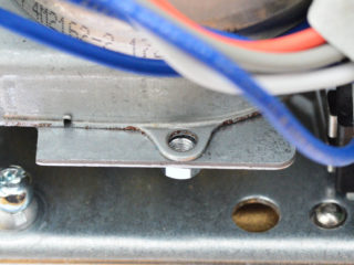 Motor securing screw position in a Honeywell motorised valvel motorised valve.